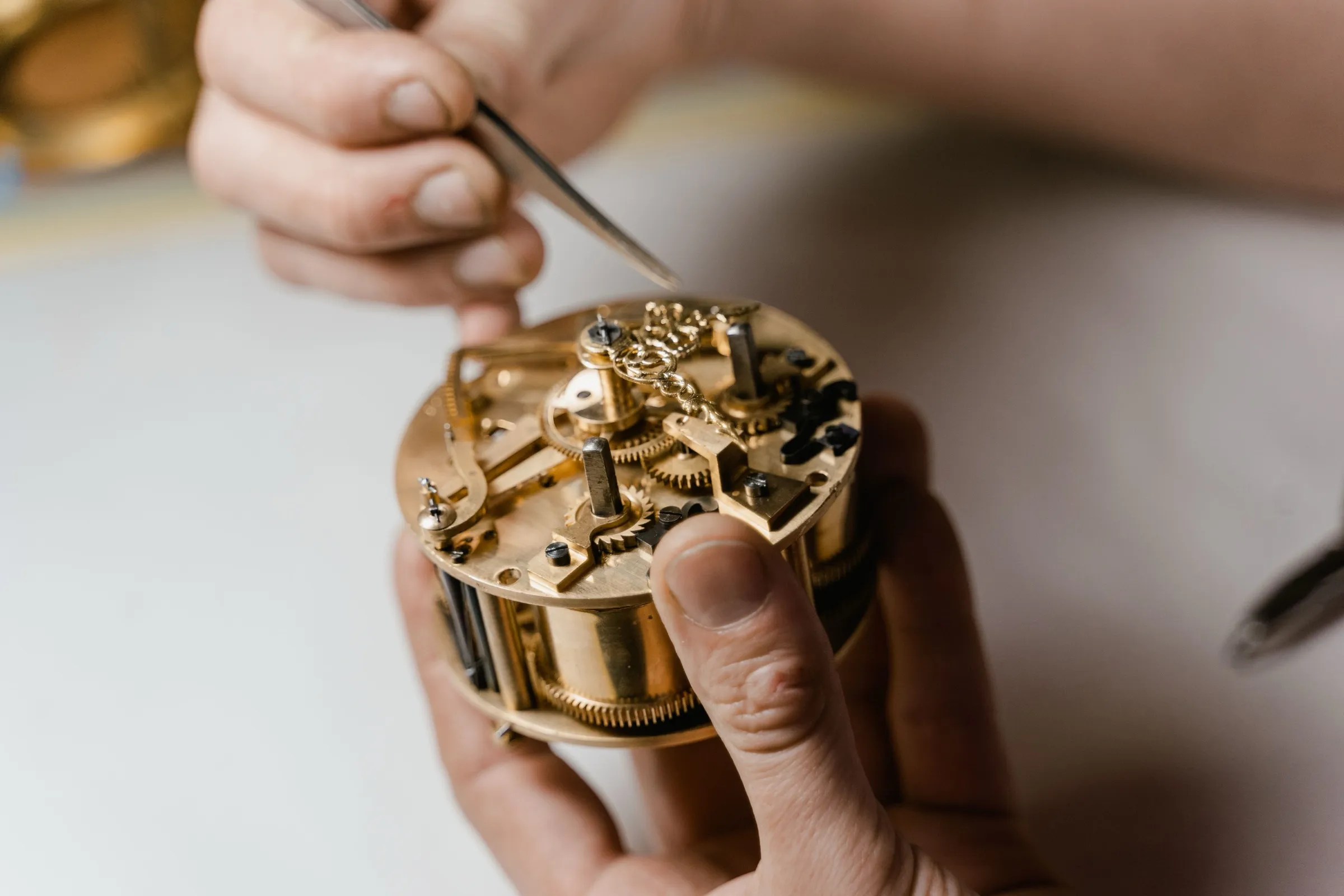 Around 130 parts go into every movement, cleaned, oiled and fitted by hand under a loupe.