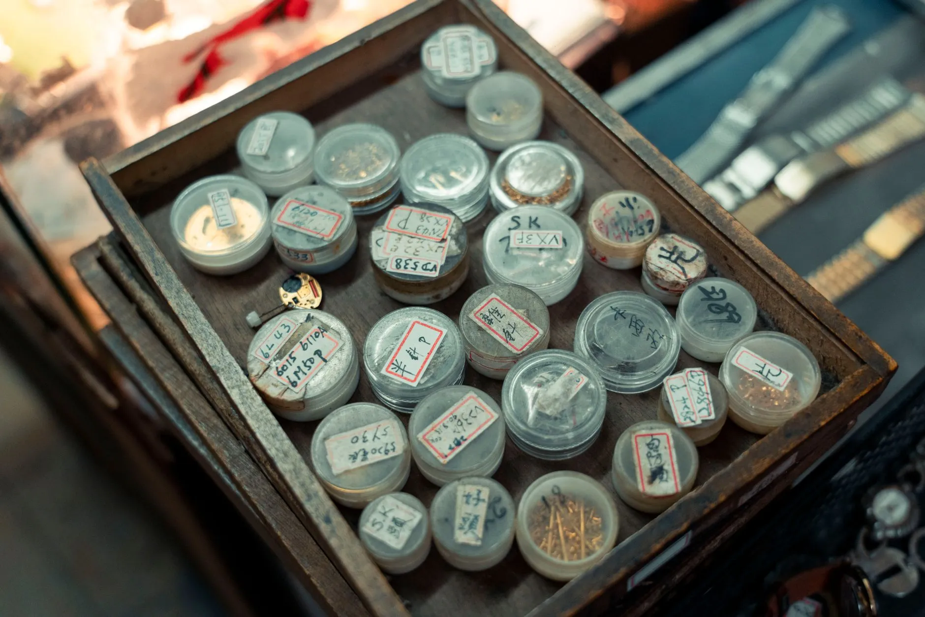 A drawer of labelled parts jars